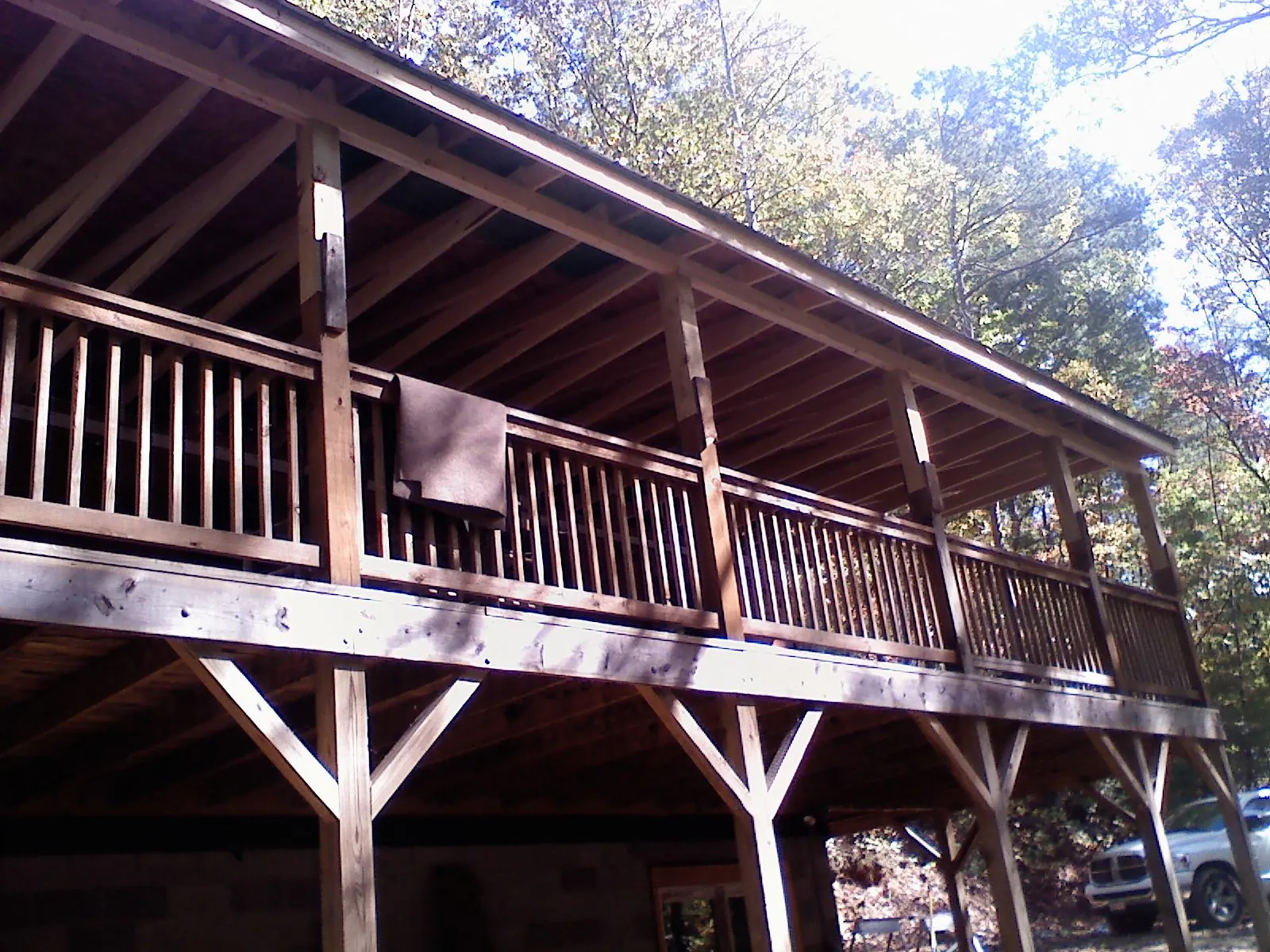 Timber framing under a new elevated porch and deck — Roof Leak Repair in Far Rockaway by Roofing Brothers